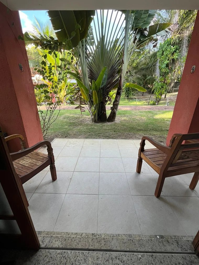 Varanda térrea com vista para o jardim do Reserva Timeantube